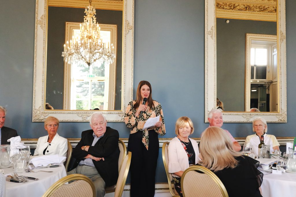 Lucy Jackson, Spread a Smile CEO, speaking at the CWRF Charity Golf Day at Moor Park Golf Club about the charity’s work supporting children in hospitals.